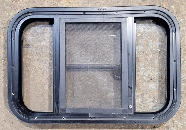 Used Black Radius Opening Window : 23 1/4" W x 15 1/4" H x 1 3/4" - Young Farts RV Parts