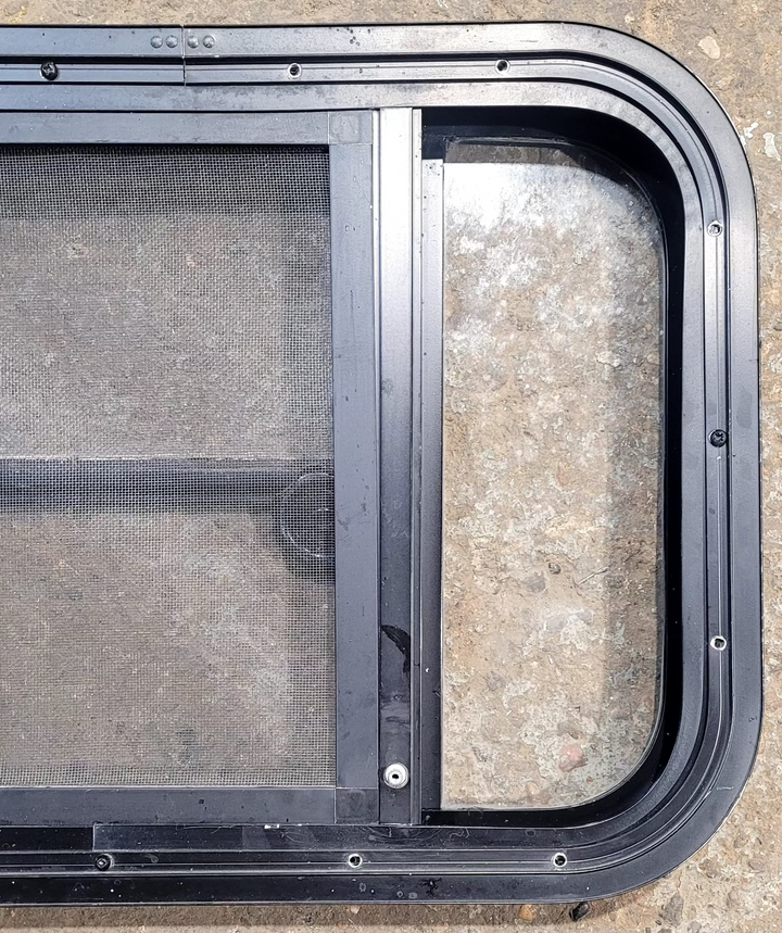 Used Black Radius Opening Window : 23 1/4" W x 15 1/4" H x 1 3/4" - Young Farts RV Parts