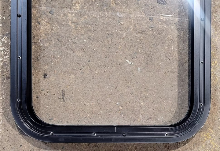 Used Black Radius Non Opening Window : 17 1/4" W x 22 1/4" H x 1 5/8" - Young Farts RV Parts
