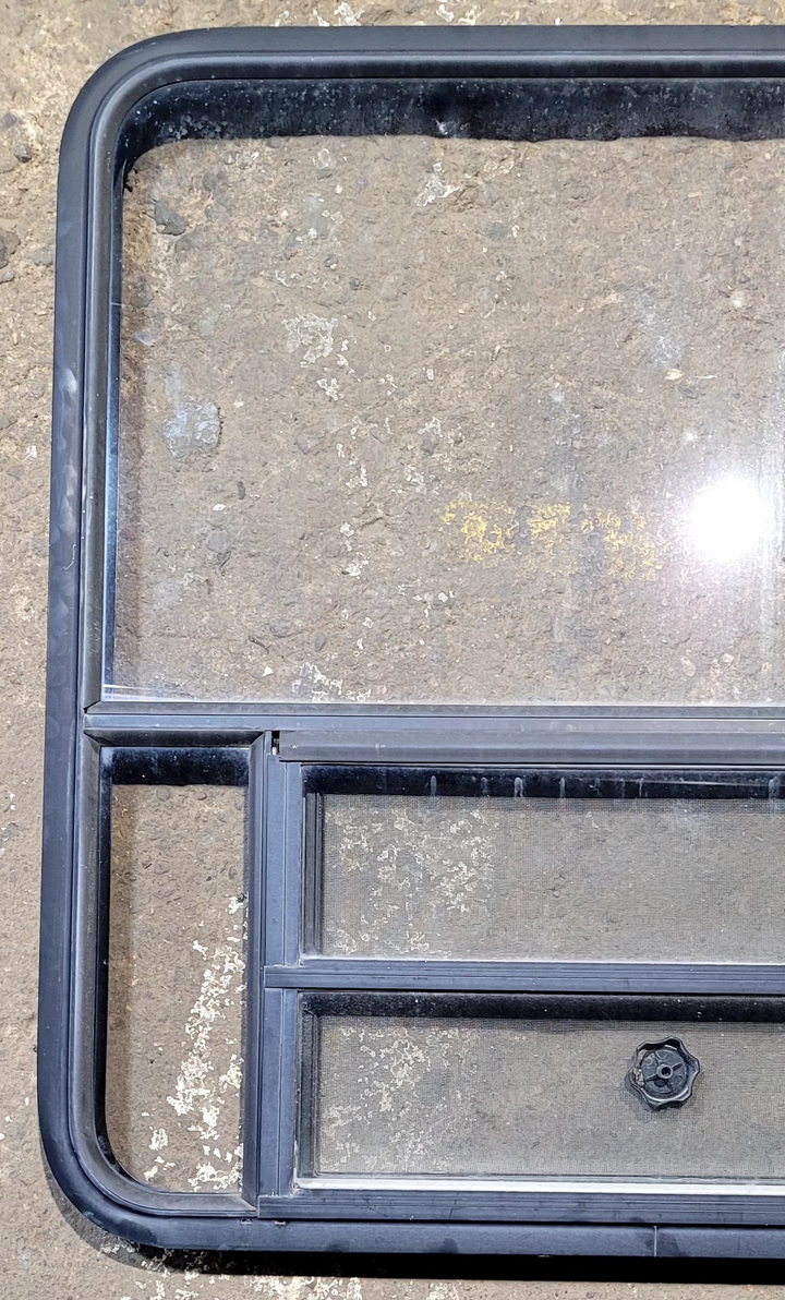 Used Black Radius Opening Window : 35 1/4" W x 36 1/4" H x 1 3/4" - Young Farts RV Parts