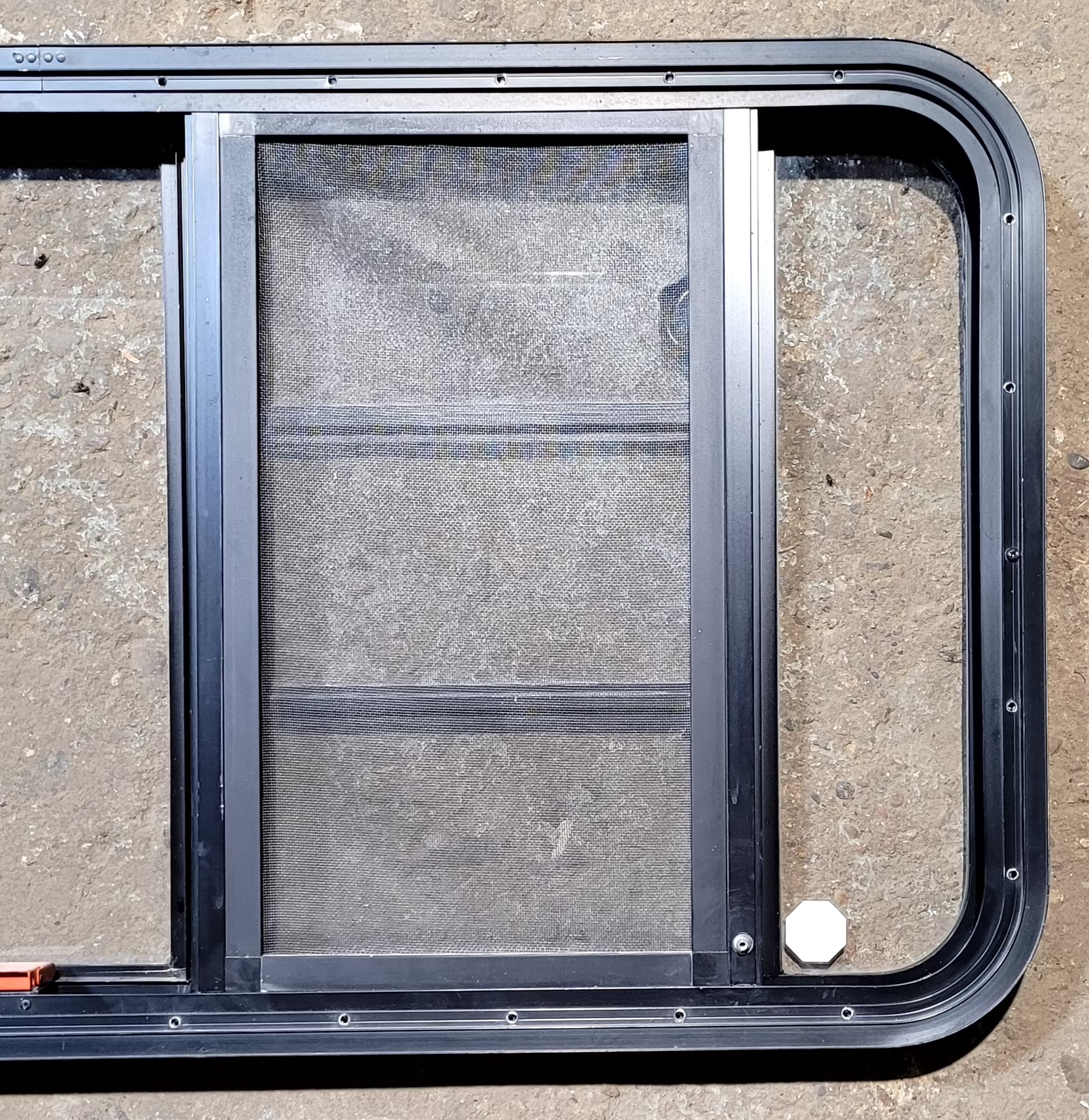 Used Black Radius Emergency Opening Window : 47 1/4" W x 22 1/4" H x 1 3/4" - Young Farts RV Parts