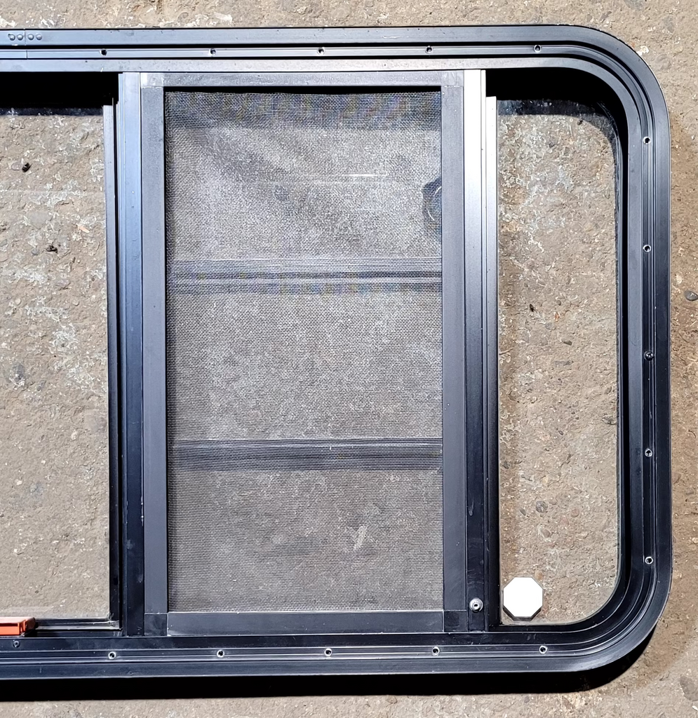 Used Black Radius Emergency Opening Window : 47 1/4" W x 22 1/4" H x 1 3/4"