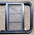 Used Black Radius Emergency Opening Window : 47 1/4" W x 22 1/4" H x 1 3/4" - Young Farts RV Parts