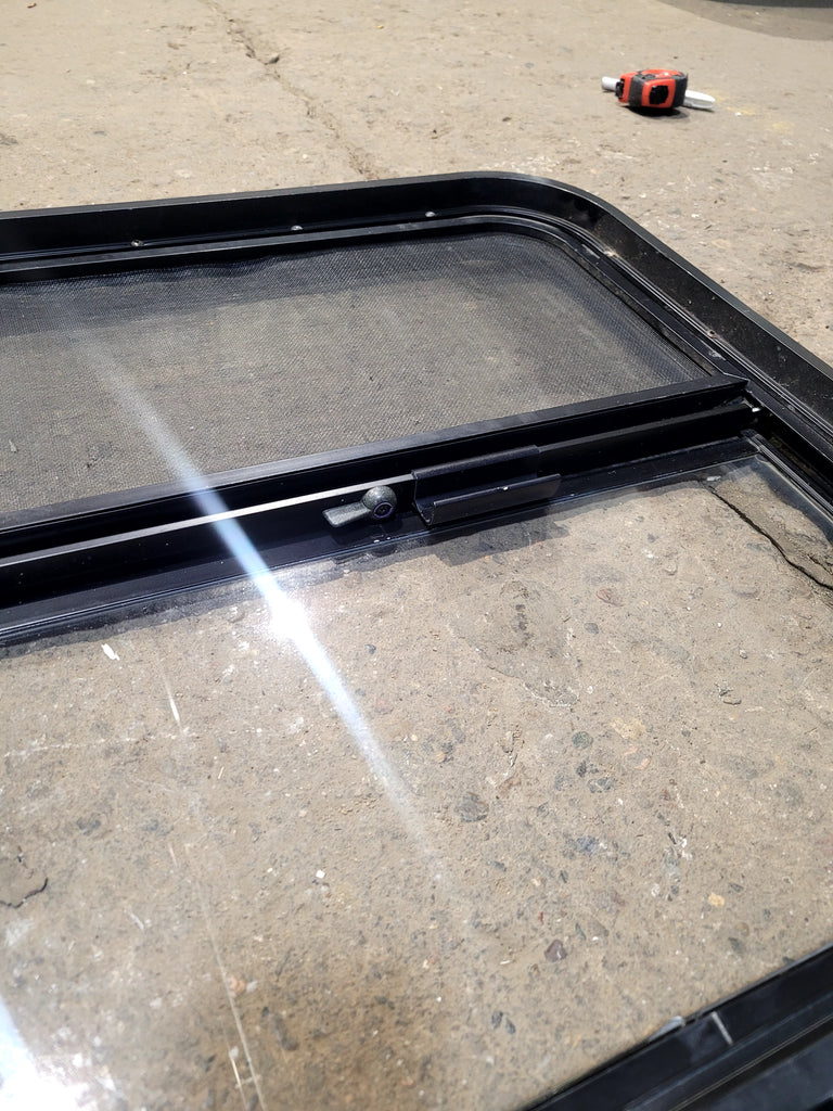 Used Black Radius Opening Window : 23 1/4" W x 21 3/4" H x 1 3/4"