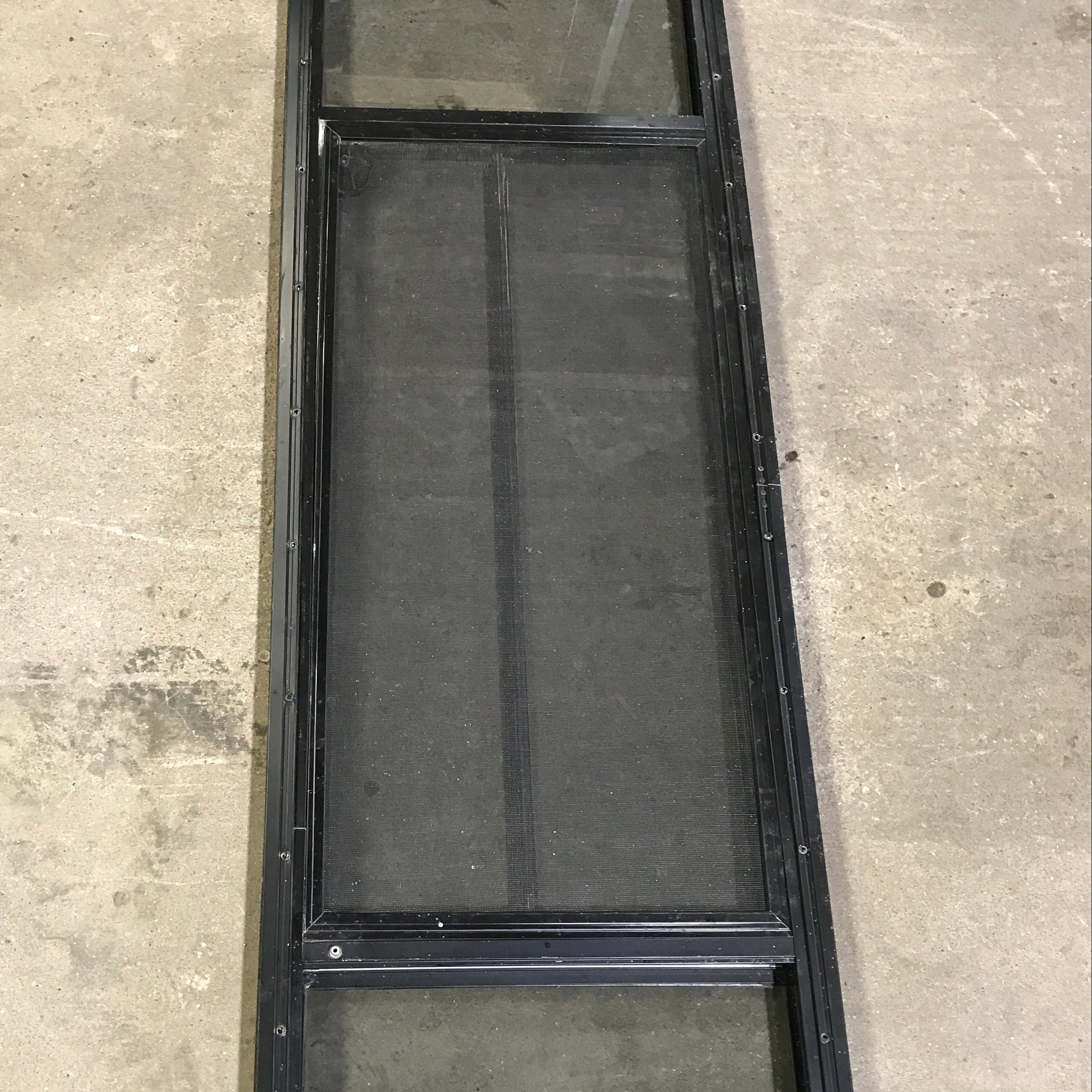 Used Black Radius Opening Window : 59.75" x 17.75" x 2" - Young Farts RV Parts