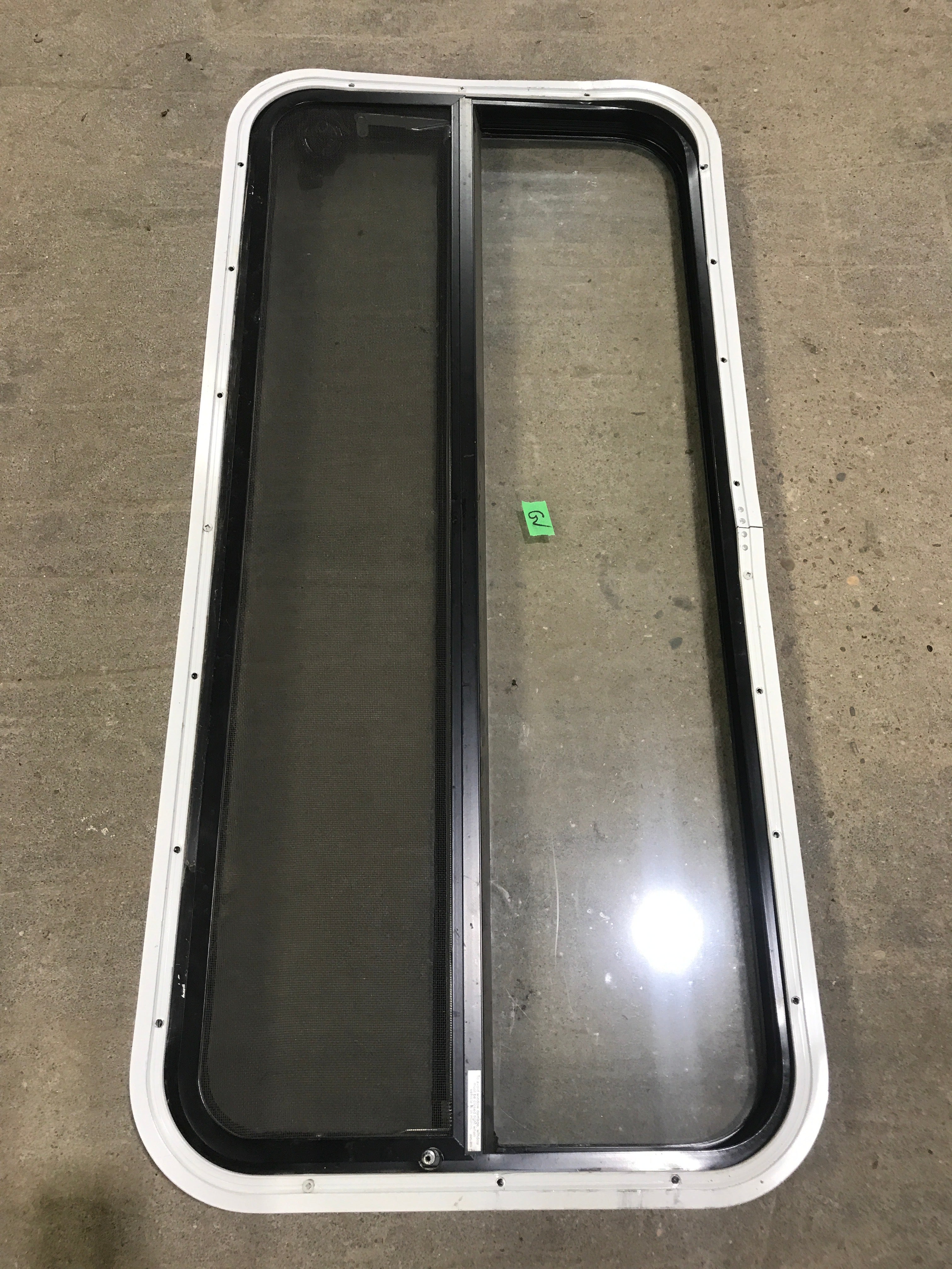 Used Black Radius Opening Window : 41 1/2" W x 19 1/2" H x 2" D - Young Farts RV Parts
