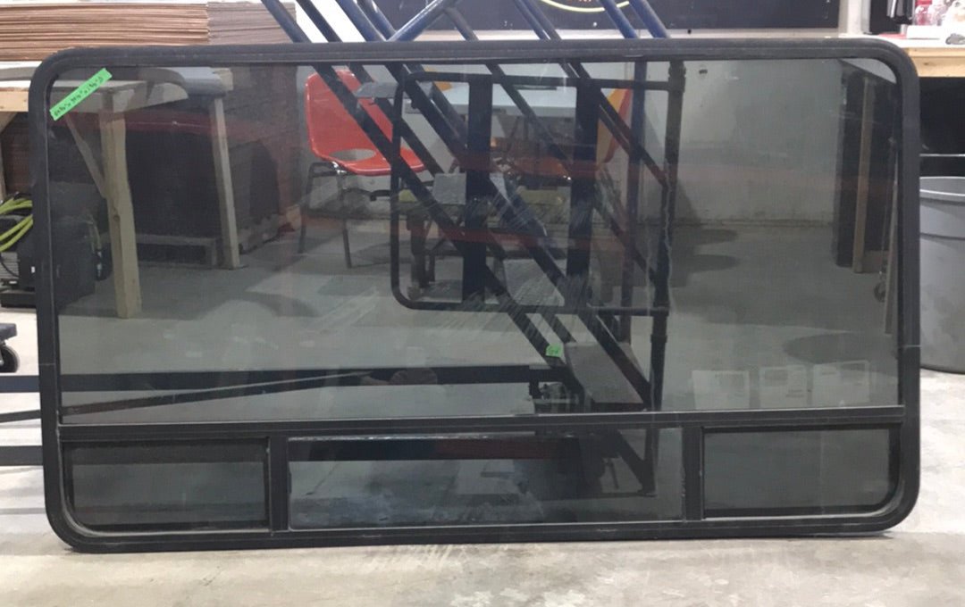 Used Black Radius Window : 69 3/4" W x 39 1/4" H x 1 1/4" D