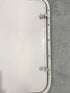 Used Radius Corner cargo door  23 3/4" W  x 21 3/4" H x  1/2" D