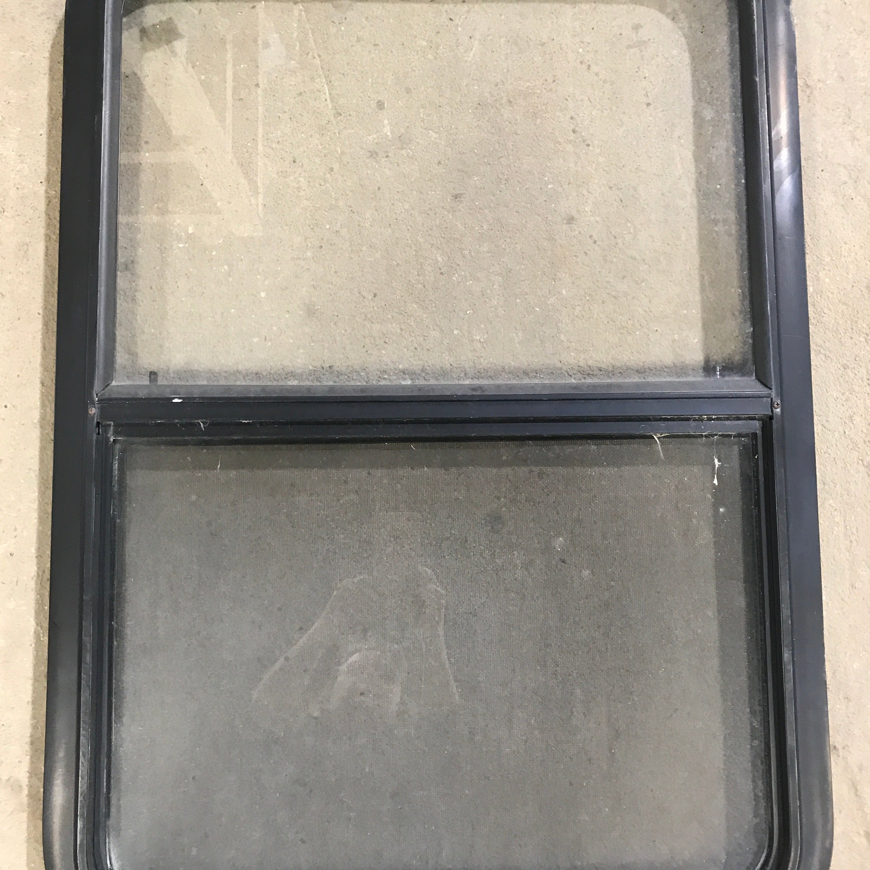 Used Black Radius Opening Window : 23" X 34.5" X 1.875" - Young Farts RV Parts
