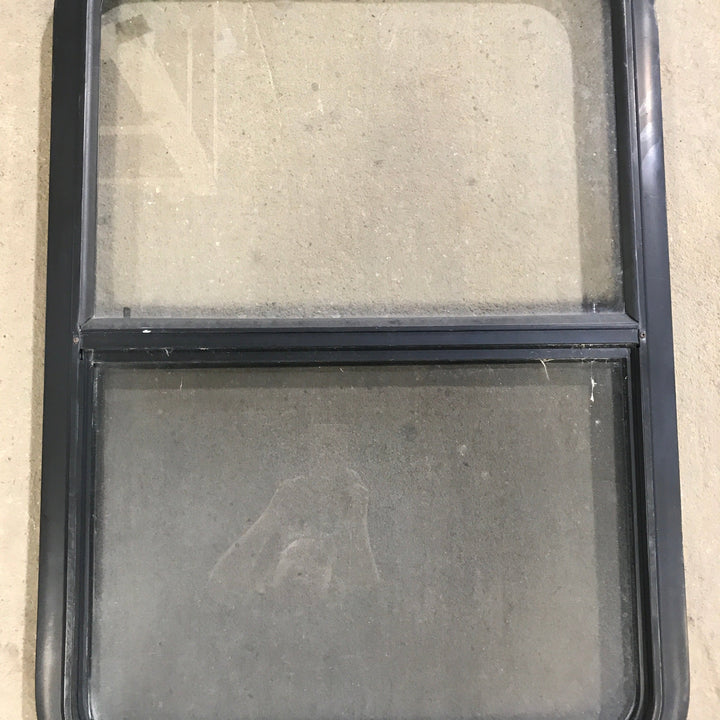 Used Black Radius Opening Window : 23" X 34.5" X 1.875" - Young Farts RV Parts