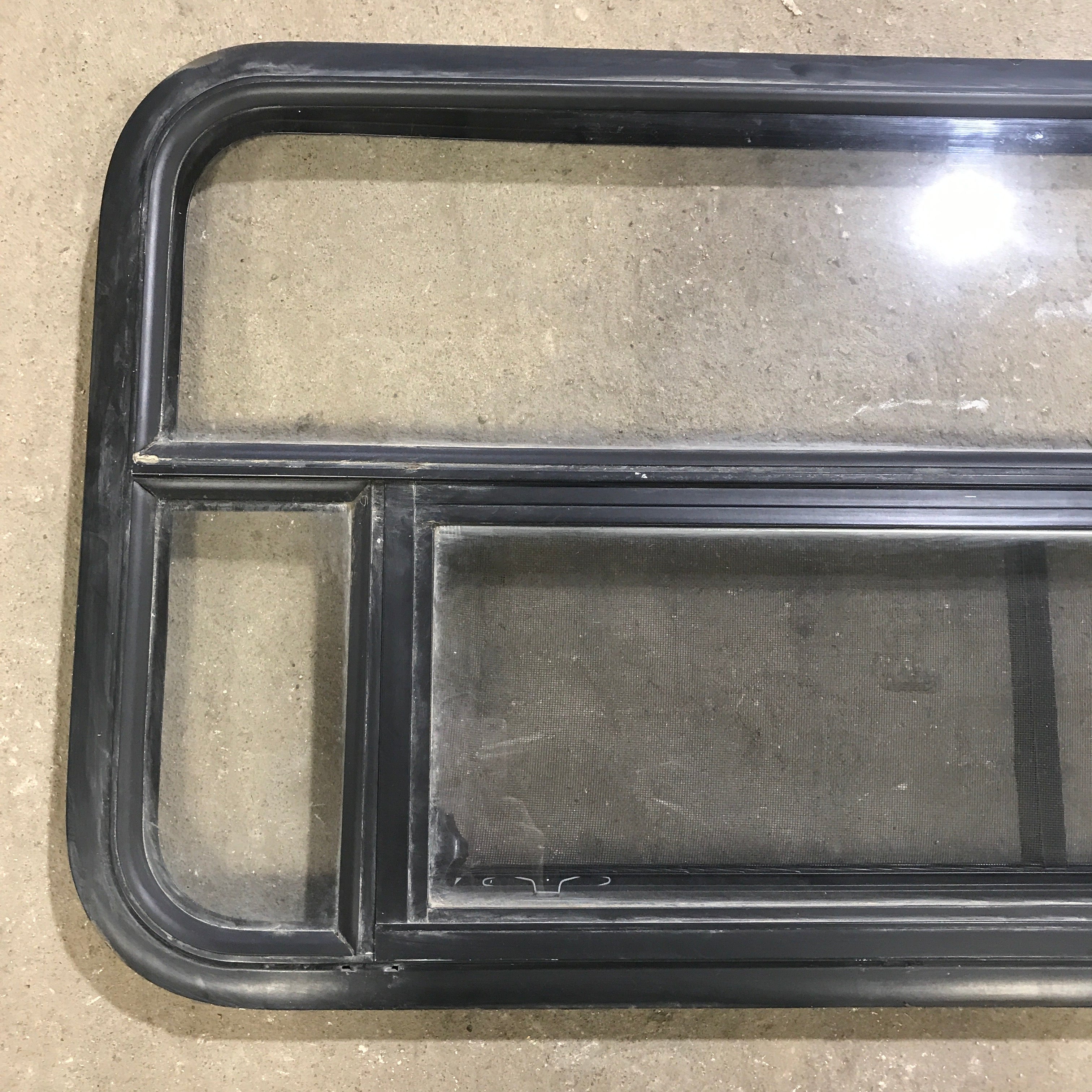 Used Black Radius Opening Window : 45.5" x 21.25" x 1.875" - Young Farts RV Parts