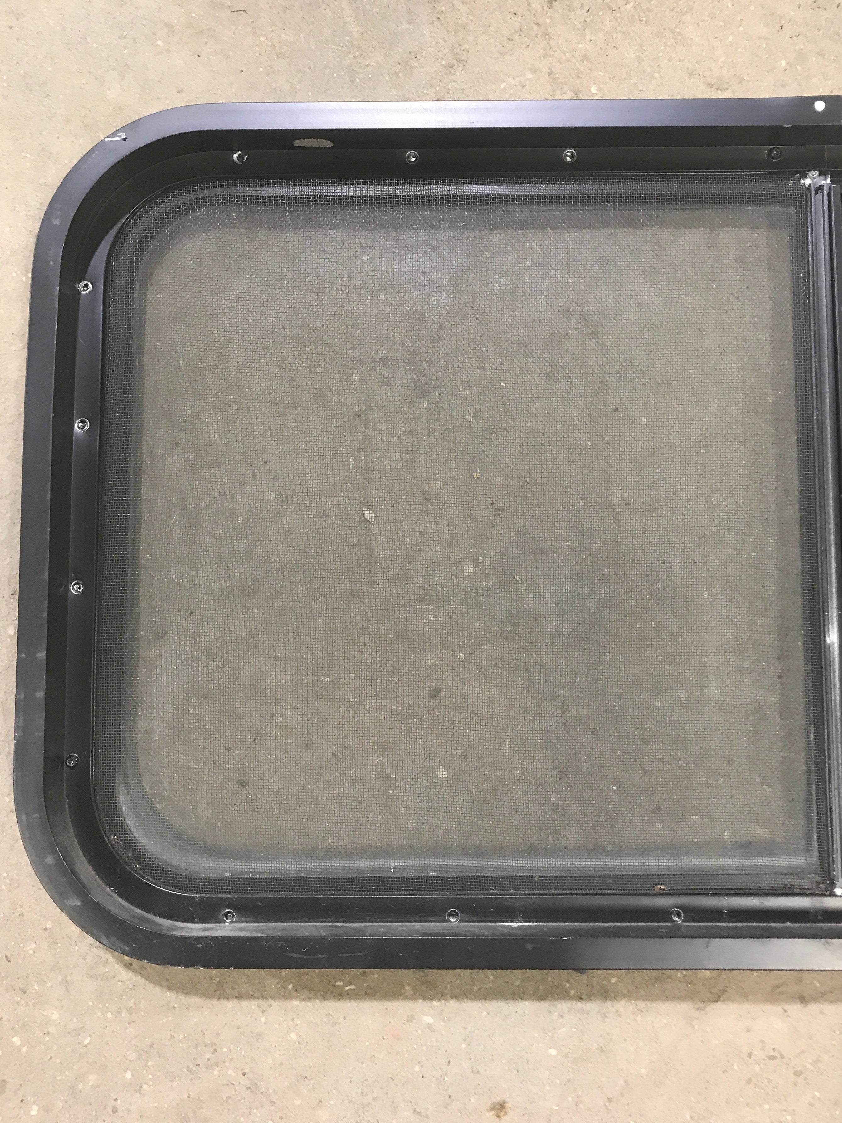 Used Slanted Black Radius Opening Window : 41 3/4" W x 17 1/2" H x 1 7/8" D - Young Farts RV Parts