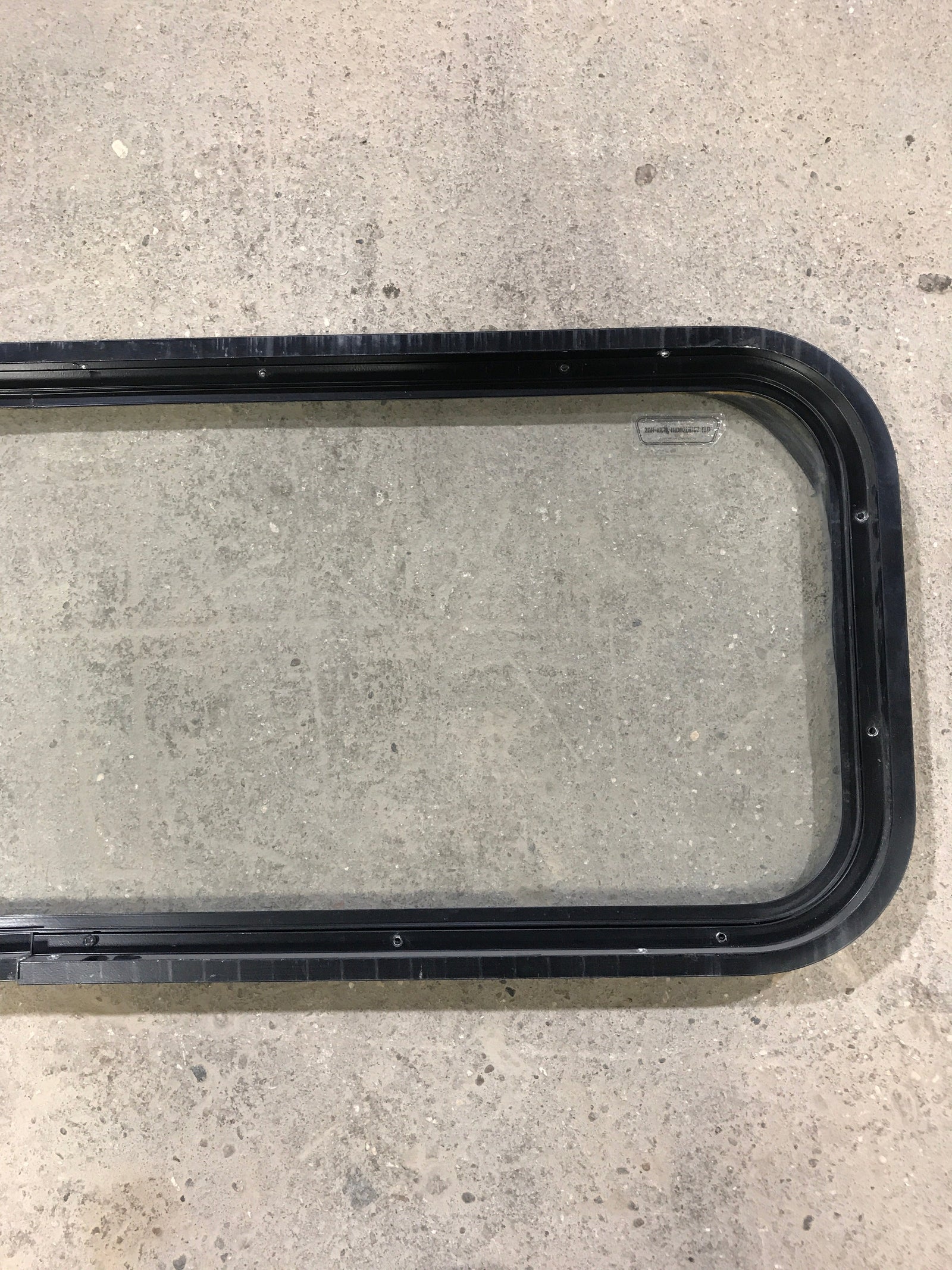 Used Black Radius Non Opening Window : 41 3/4