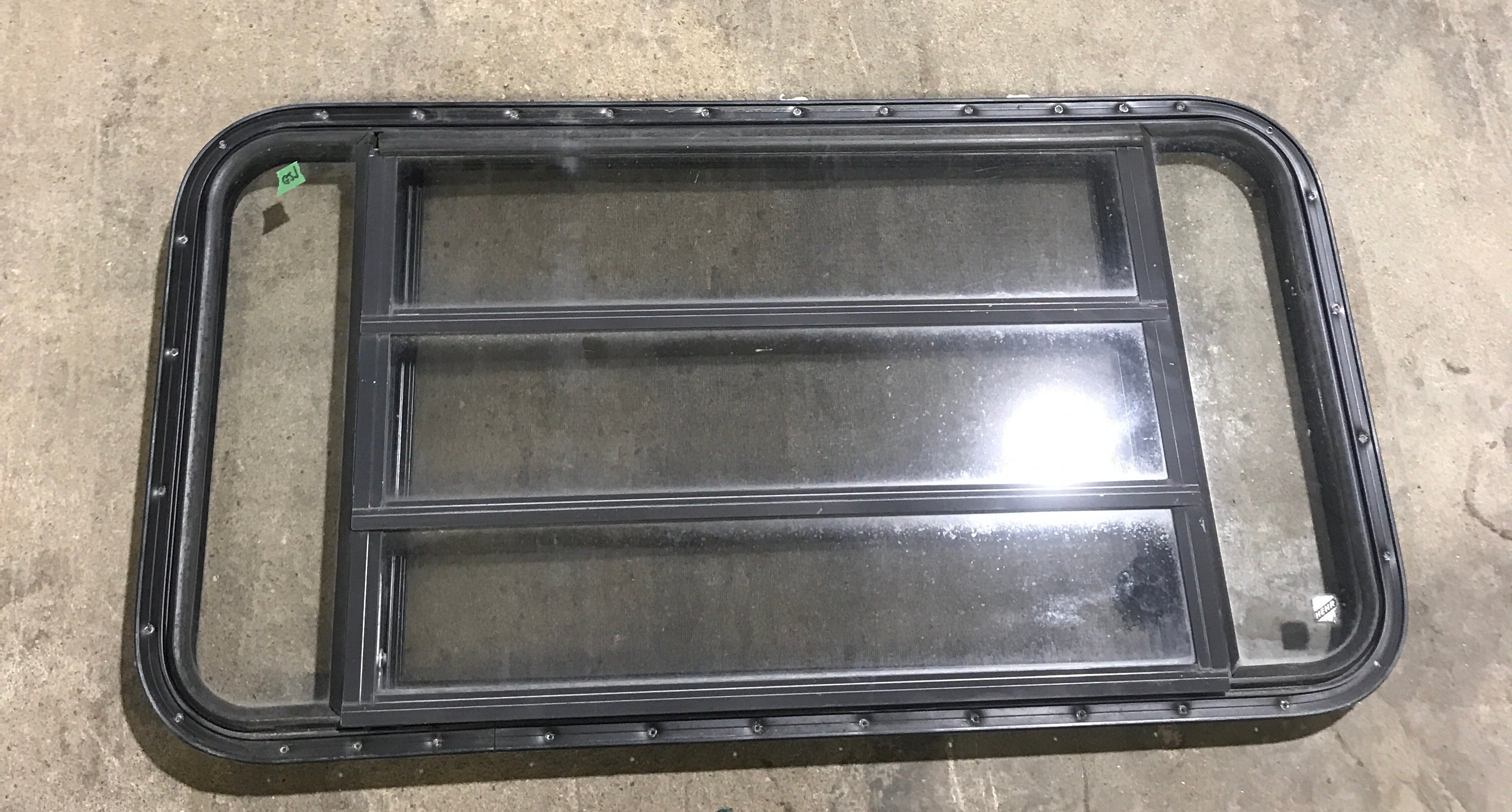 Used Black Radius Opening Window : 42 1/2" W x 22 1/2" H x 1 1/2" D