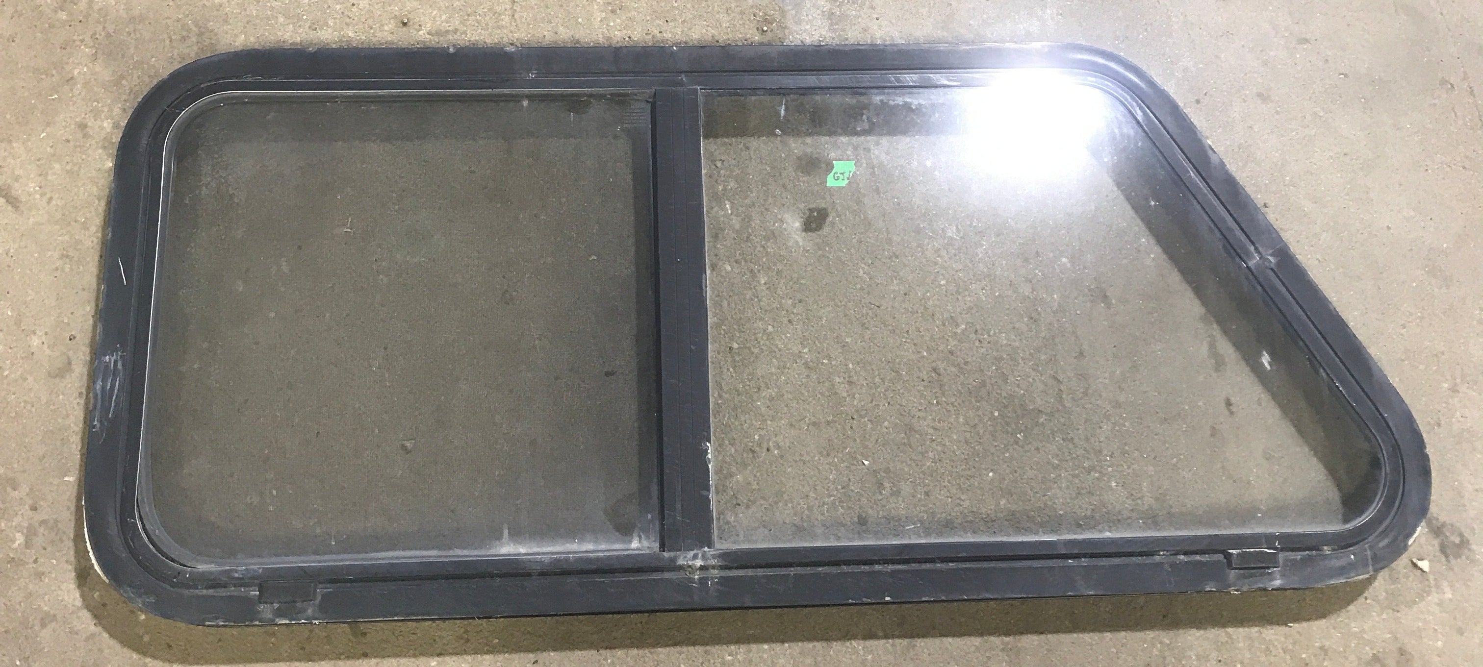 Used Slanted Black Radius Opening Window : 41 3/4" W x 17 1/2" H x 1 7/8" D - Young Farts RV Parts