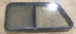 Used Slanted Black Radius Opening Window : 41 3/4" W x 17 1/2" H x 1 7/8" D - Young Farts RV Parts