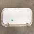 Used White Corner radius cargo door  23 3/4" W x 13 3/4" H x 1"D - Young Farts RV Parts