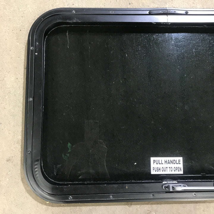 Used Black Radius Emergency Opening Window : 29.5" X 19.5" X 1.5" - Young Farts RV Parts