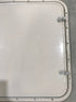 Used Radius Corner cargo door  23 3/4" W  x 21 3/4" H x  1/2" D