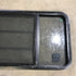 Used Black Radius Opening Window : 59.75" x 21.75" x 2" - Young Farts RV Parts