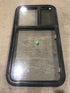 Used Black Radius Emergency Opening Window : 41 1/2" W X 21 1/2" H X 2" D - Young Farts RV Parts