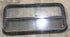 Used Black Radius Opening Window : 41 1/2" W x 19 1/2" H x 2" D - Young Farts RV Parts