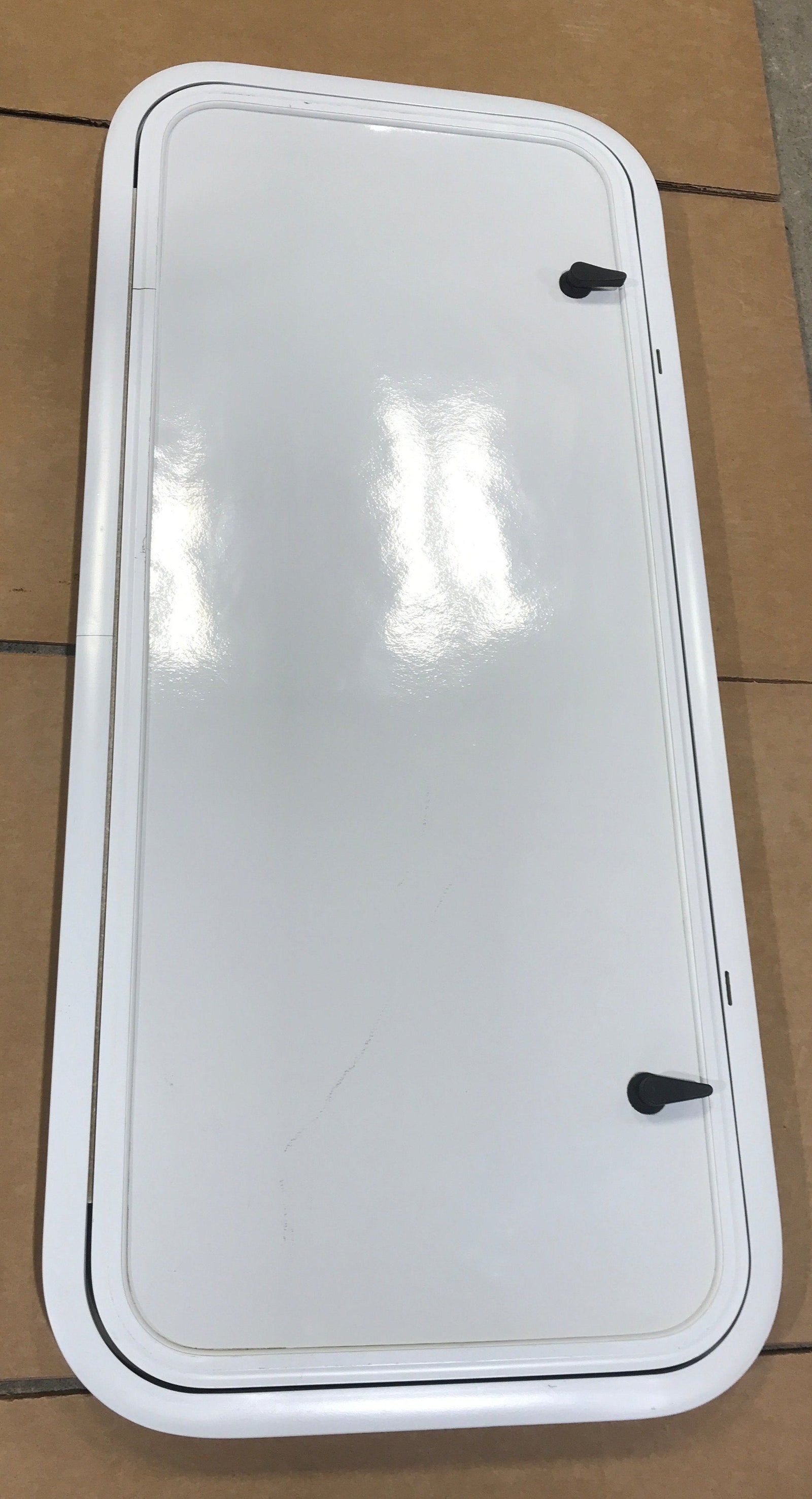 Used Radius Opening Rock Guard Covered Window: 40 1/2