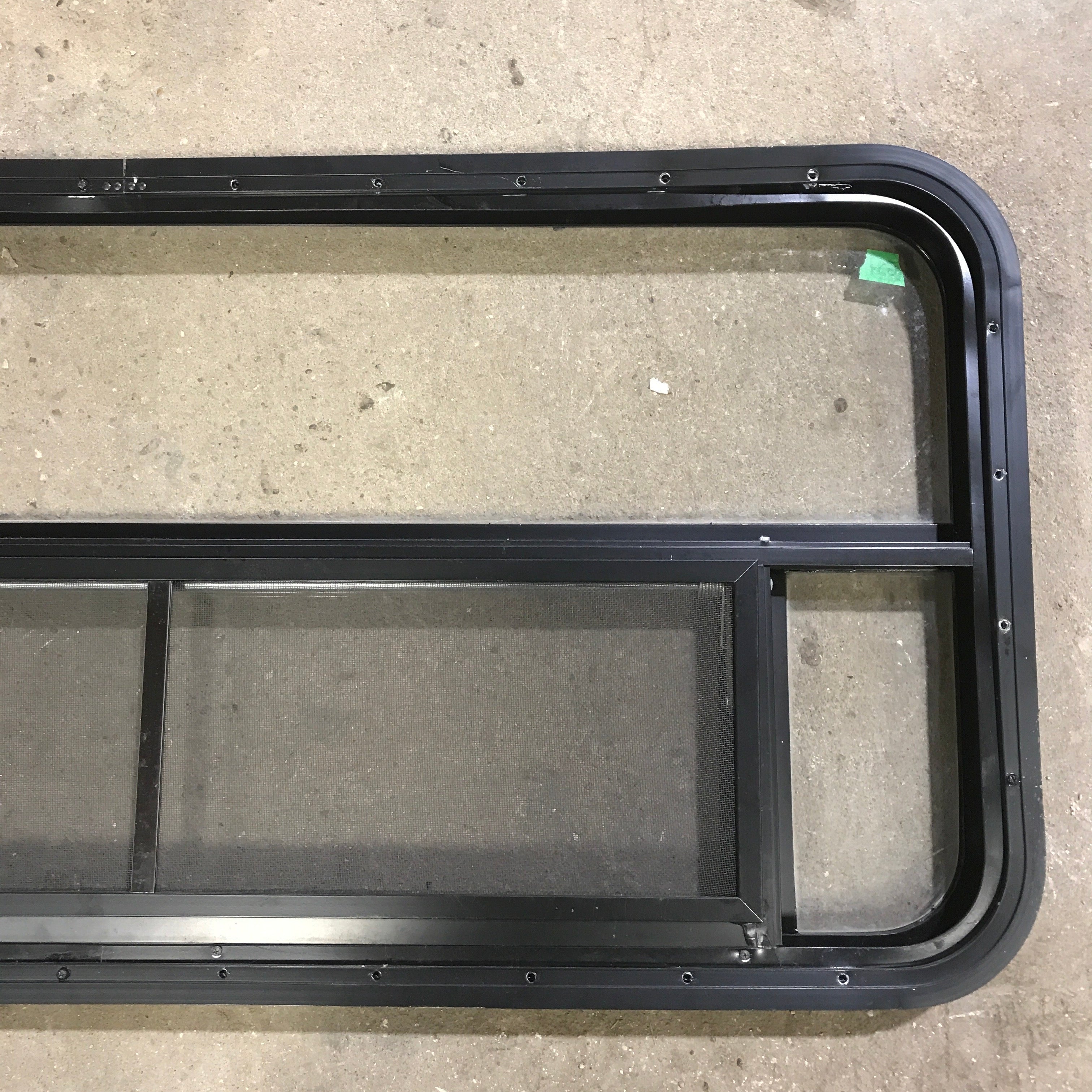 Used Black Radius Opening Window : 45.5" x 21.25" x 1.875" - Young Farts RV Parts