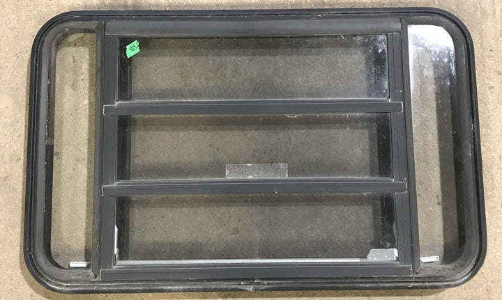 Used Black Radius Emergency Opening Window : 35 1/4" W x 21 1/4" H x 1 7/8" D