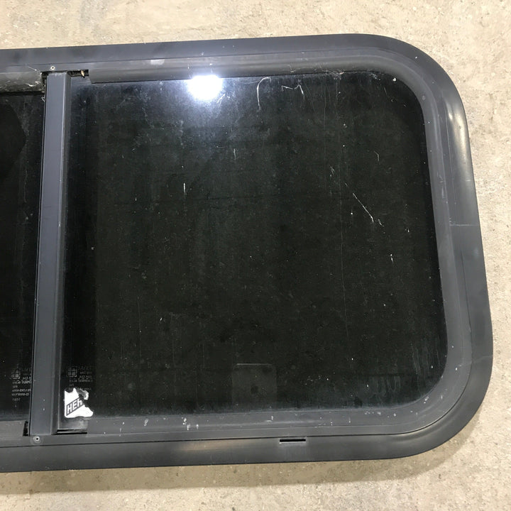 Used Black Radius Opening Window : 29.5" X 14.5" X 1.5" - Young Farts RV Parts