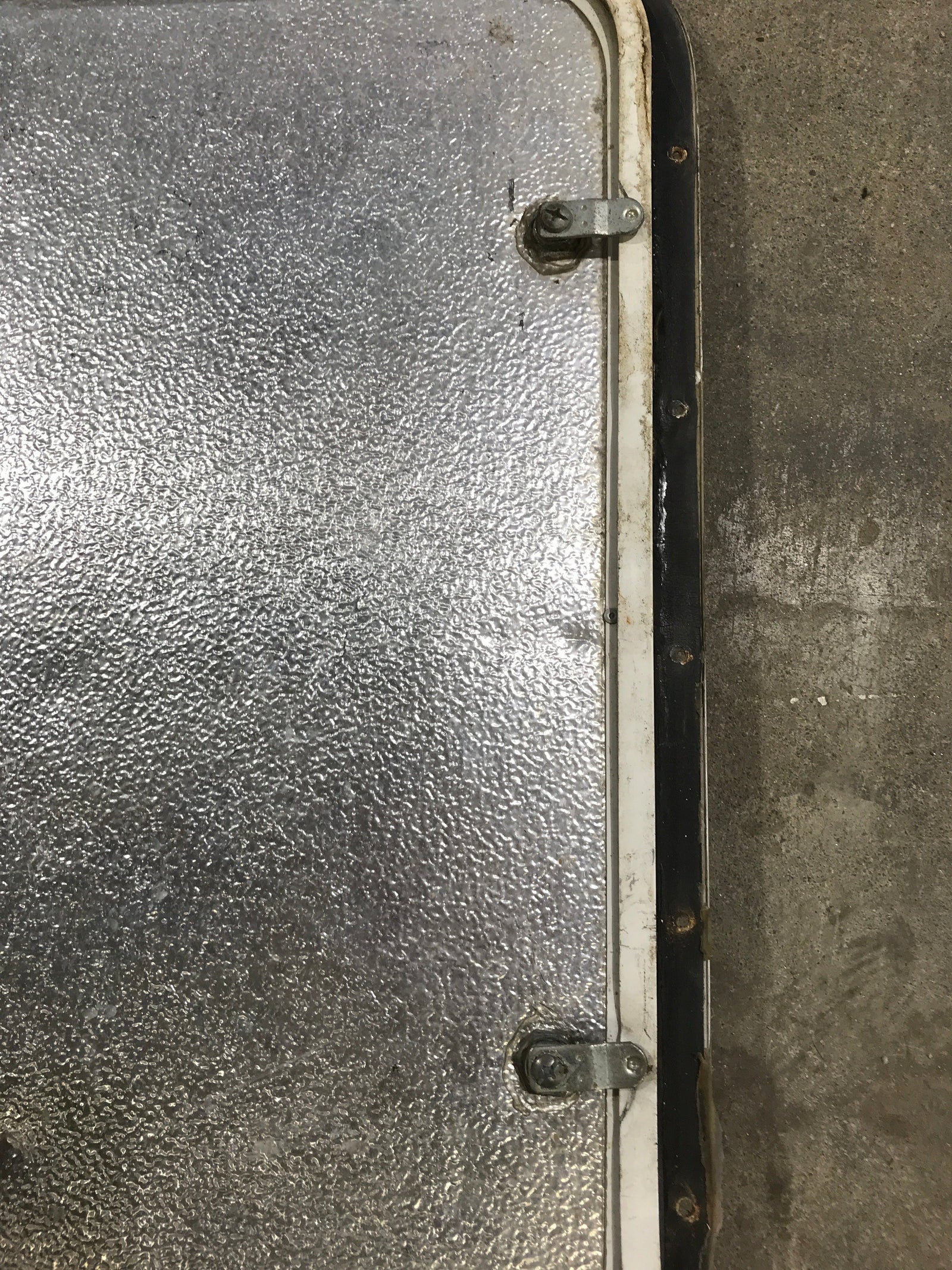 Used Radius Corner cargo door  23 3/4