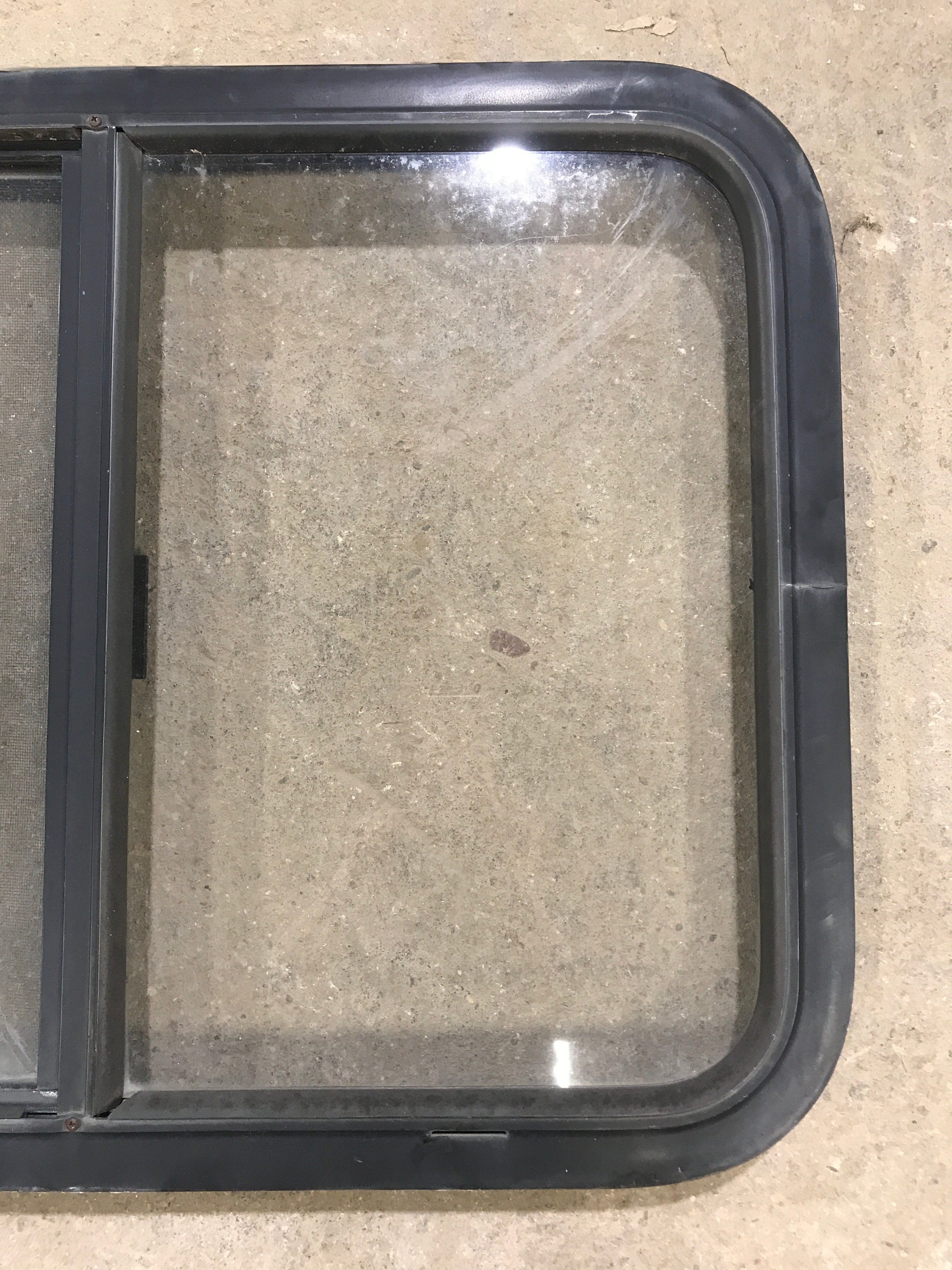 Used Black Radius Opening Window : 29.5" X 21.5" X 1.875" - Young Farts RV Parts