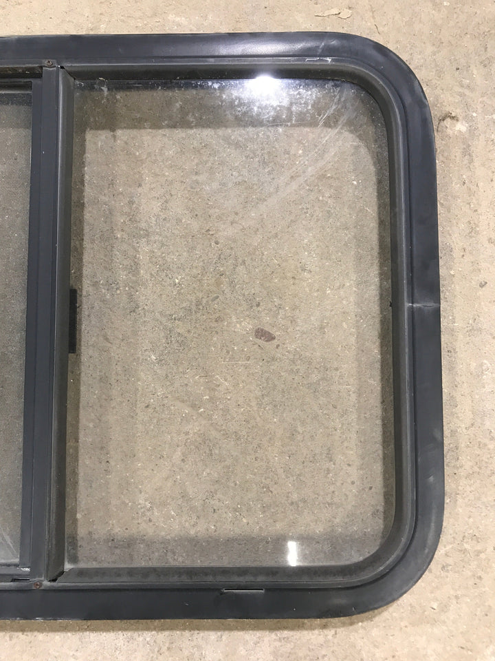 Used Black Radius Opening Window : 29.5" X 21.5" X 1.875" - Young Farts RV Parts