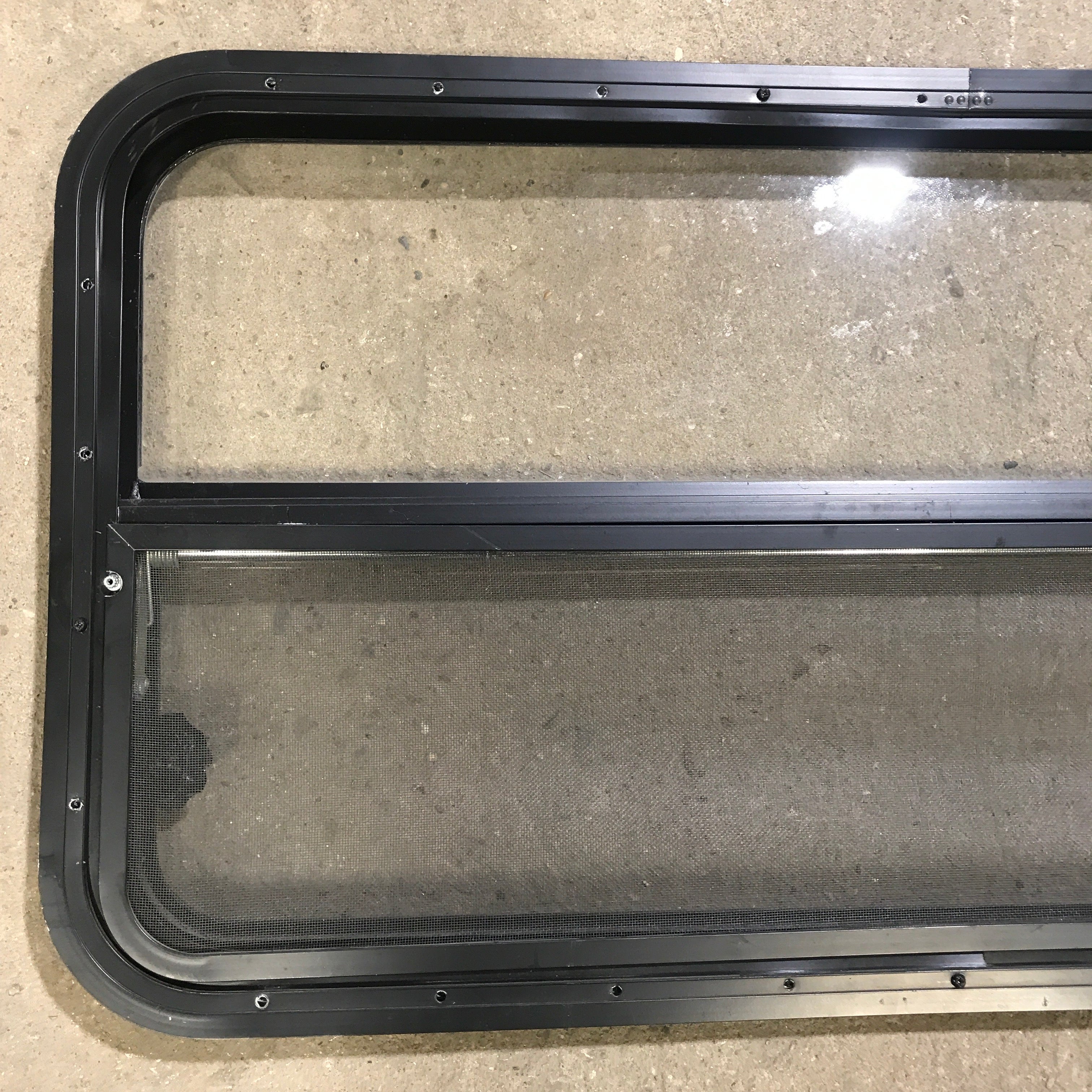 Used Black Radius Opening Window : 45.5" x 21.25" x 1.875" - Young Farts RV Parts