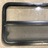 Used Black Radius Opening Window : 45.5" x 21.25" x 1.875" - Young Farts RV Parts