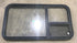 Used Black Radius Emergency Opening Window : 41 1/2" W X 21 1/2" H X 2" D - Young Farts RV Parts