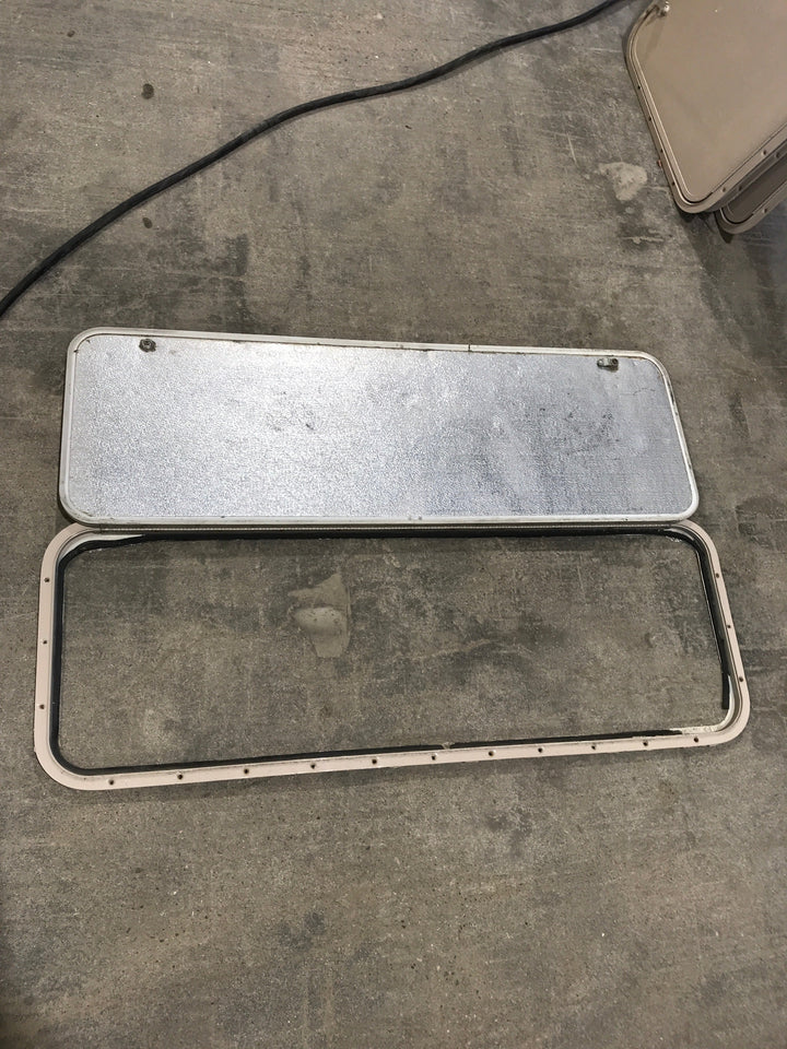 Used Radius Cornered Cargo Door 47 3/4" W x 15 3/5" H x 1/2" D - Young Farts RV Parts