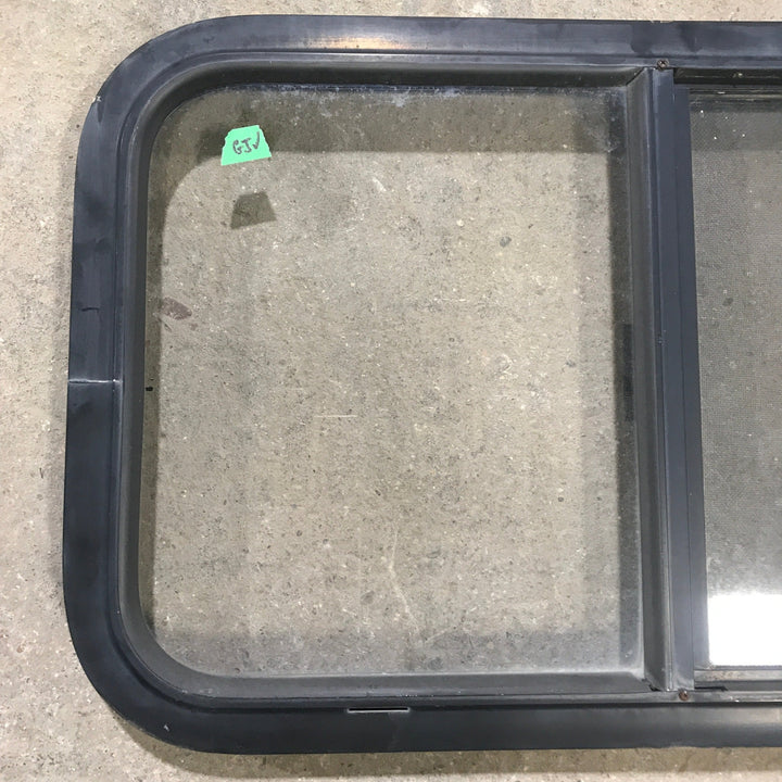 Used Black Radius Opening Window : 29.5" X 17.5" X 1.875" - Young Farts RV Parts