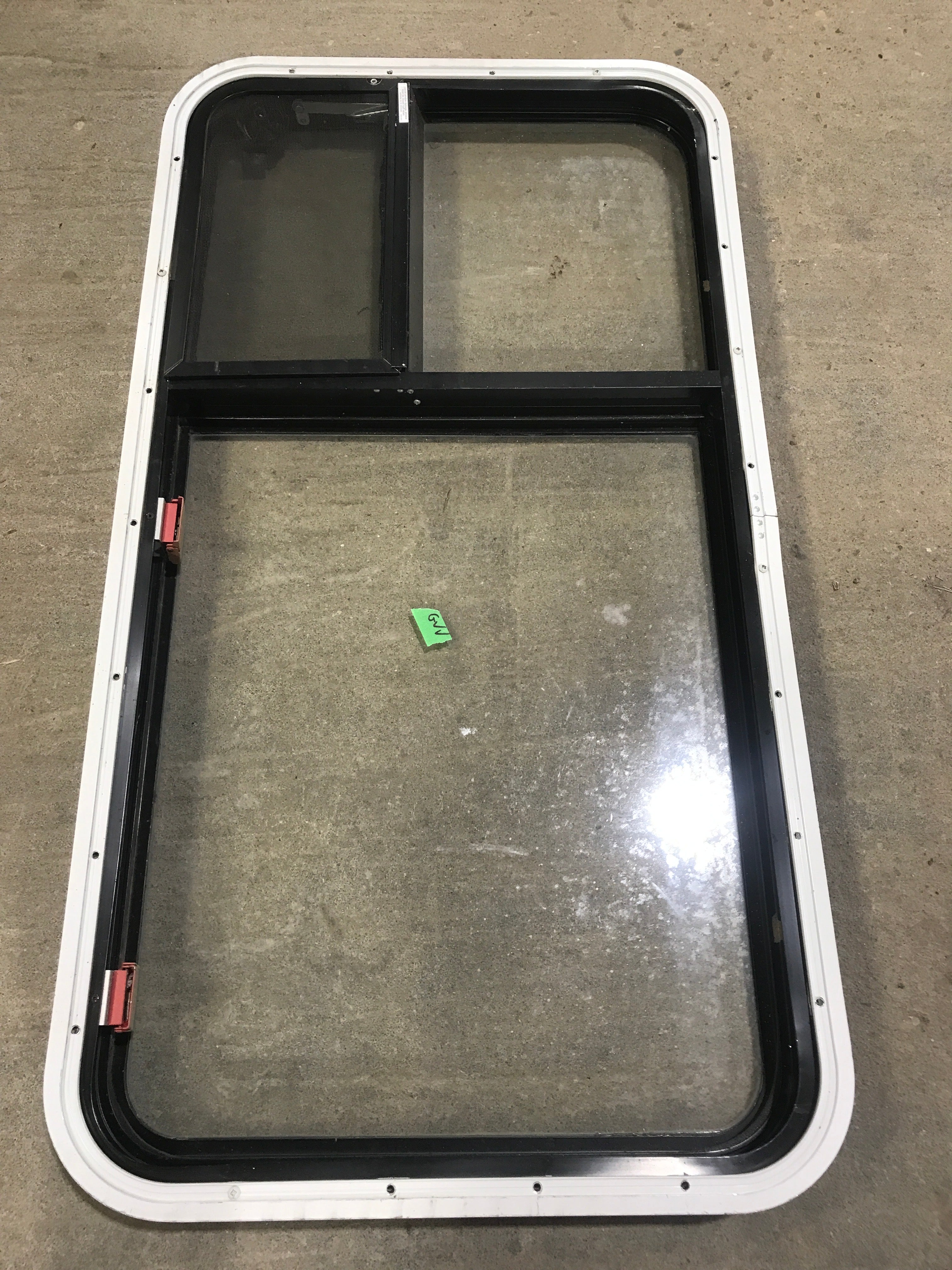 Used Black Radius Emergency Opening Window : 41 1/2" W X 21 1/2" H X 2" D - Young Farts RV Parts