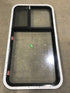 Used Black Radius Emergency Opening Window : 41 1/2" W X 21 1/2" H X 2" D - Young Farts RV Parts