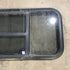 Used Black Radius Opening Window : 59.75" x 17.75" x 2" - Young Farts RV Parts