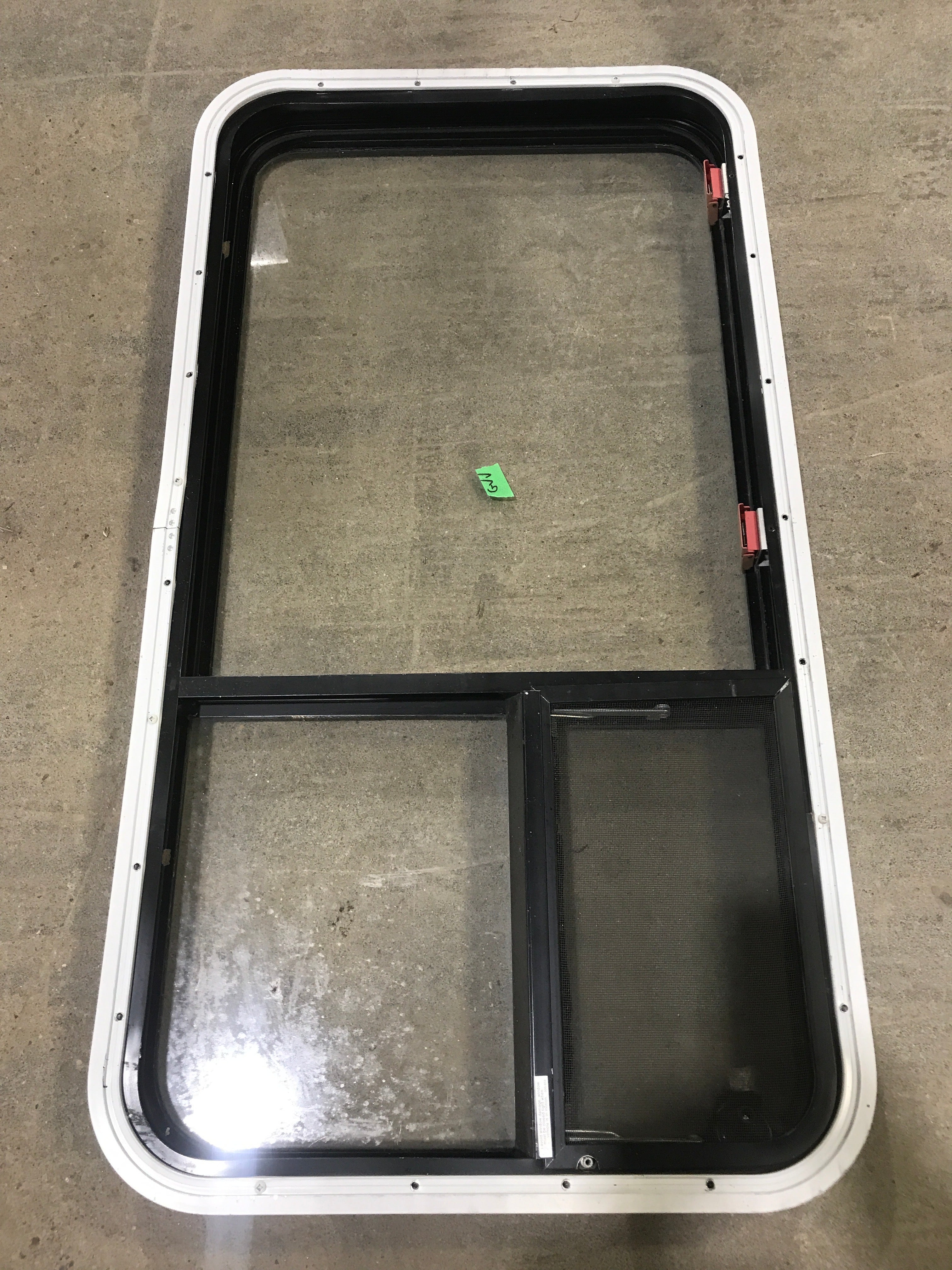 Used Black Radius Emergency Opening Window : 41 1/2" W X 21 1/2" H X 2" D - Young Farts RV Parts