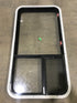 Used Black Radius Emergency Opening Window : 41 1/2" W X 21 1/2" H X 2" D - Young Farts RV Parts