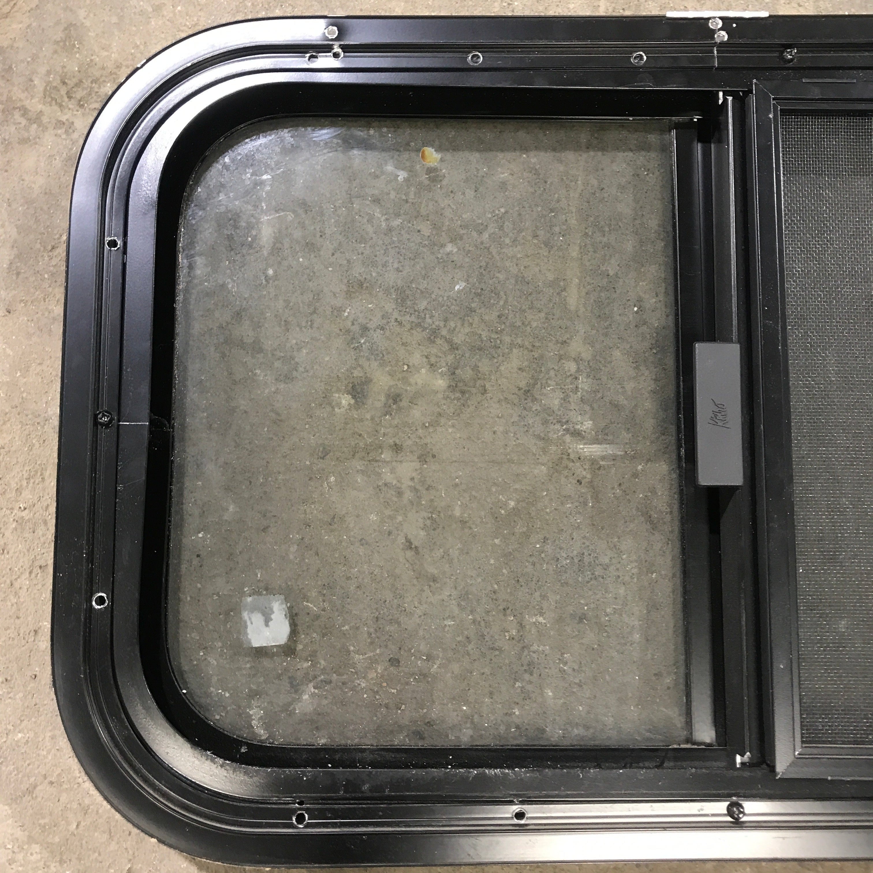 Used Black Radius Opening Window : 23.5" X 14.5" X 1.25" - Young Farts RV Parts