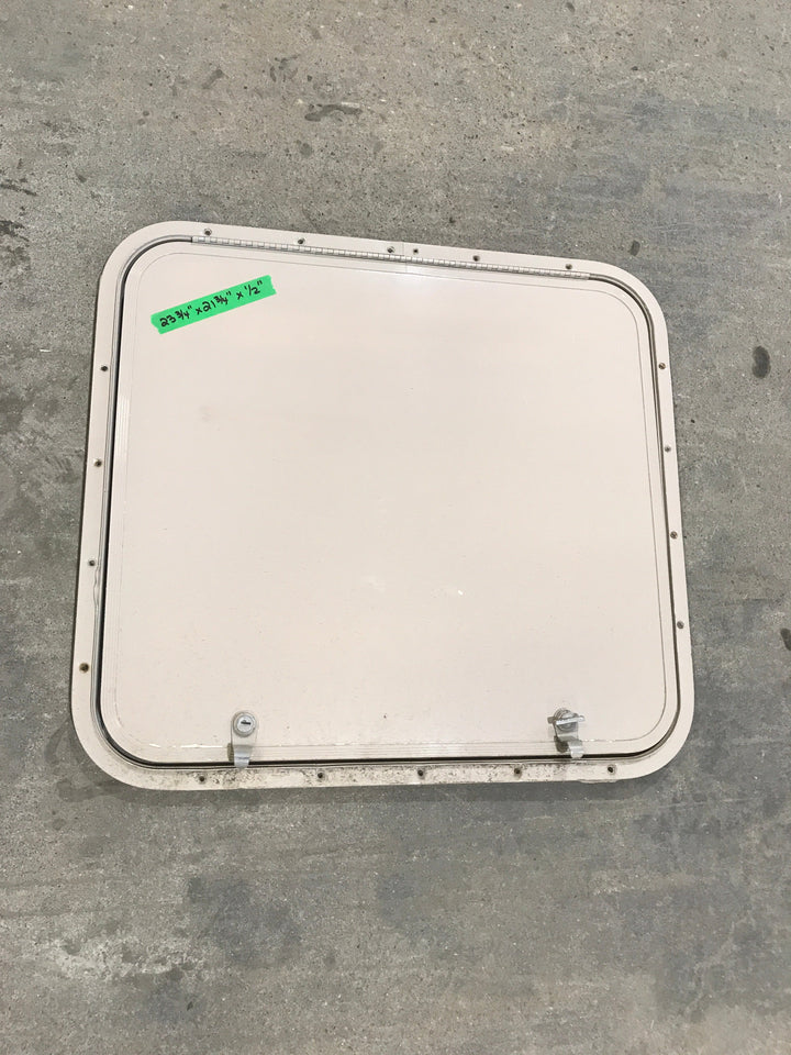 Used Radius Corner cargo door  23 3/4" W  x 21 3/4" H x  1/2" D