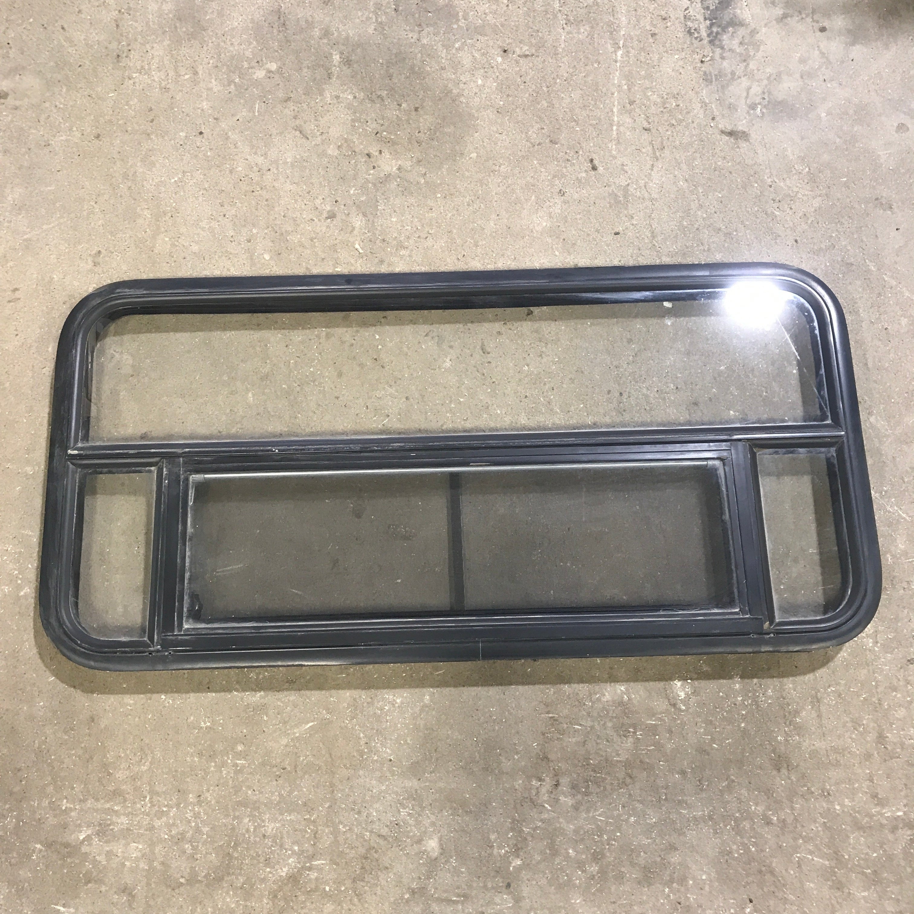 Used Black Radius Opening Window : 45.5" x 21.25" x 1.875" - Young Farts RV Parts