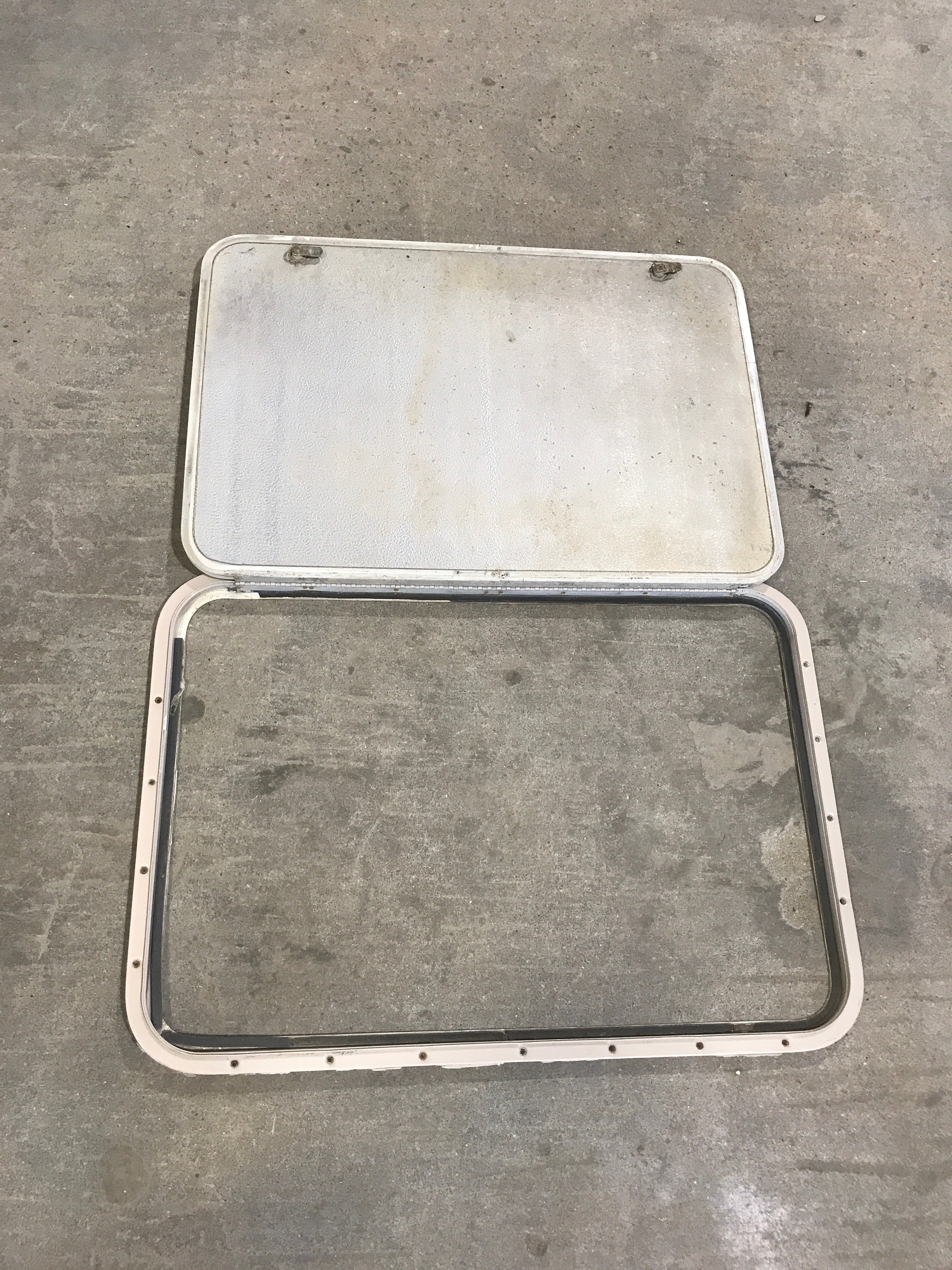 Used Radius Cornered Cargo Door 31 3/4" W  x 21 3/4" H x  1/2" D