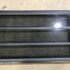 Used Black Radius Opening Window : 59.75" x 21.75" x 2" - Young Farts RV Parts