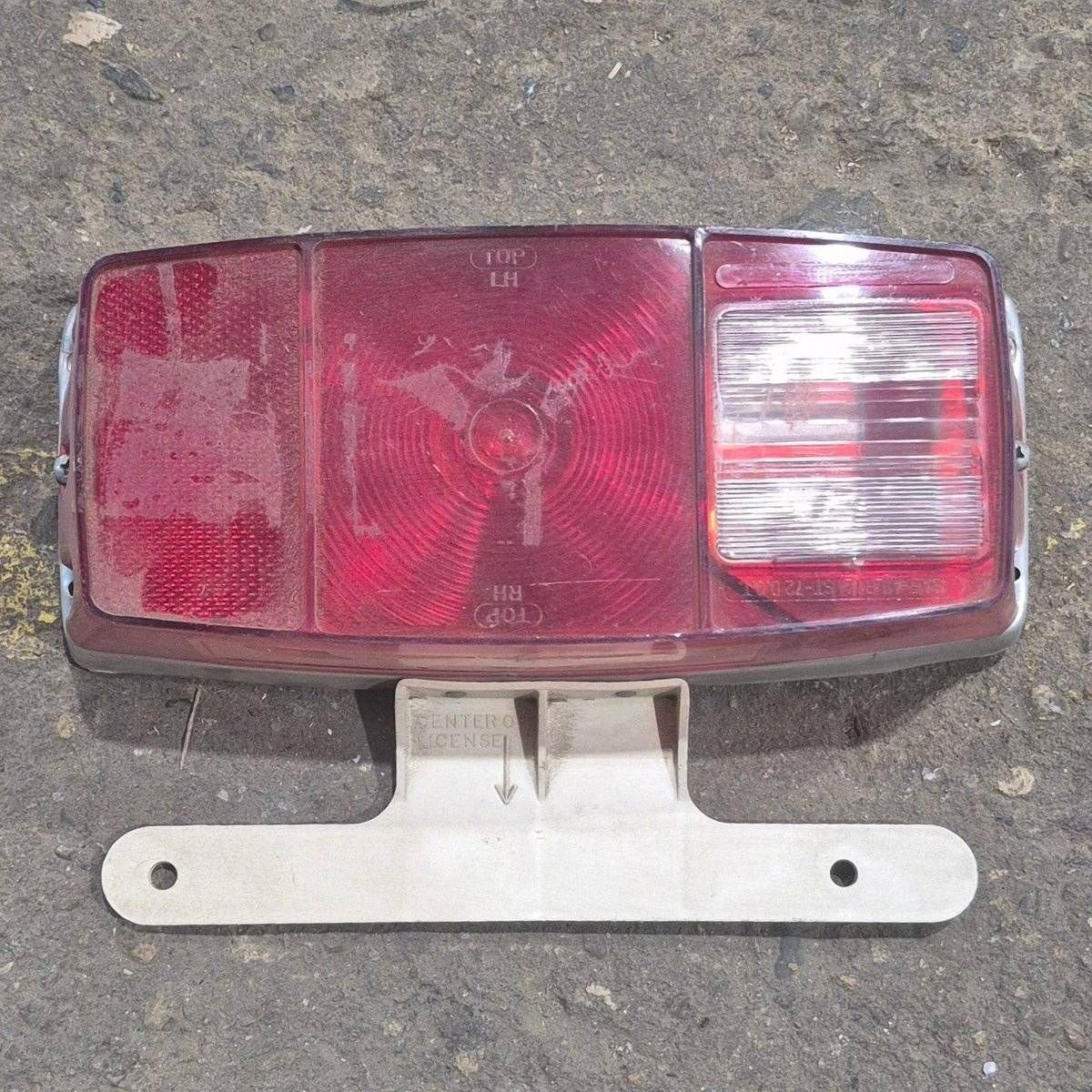 Used Miro-Flex RV Tail Light Assembly, With License Plate Bracket,  10 1/8