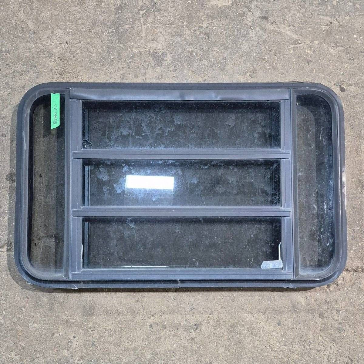 Used Black Radius Opening Window - 35 1/8" X 21 1/4" X 1 7/8" - Black Window